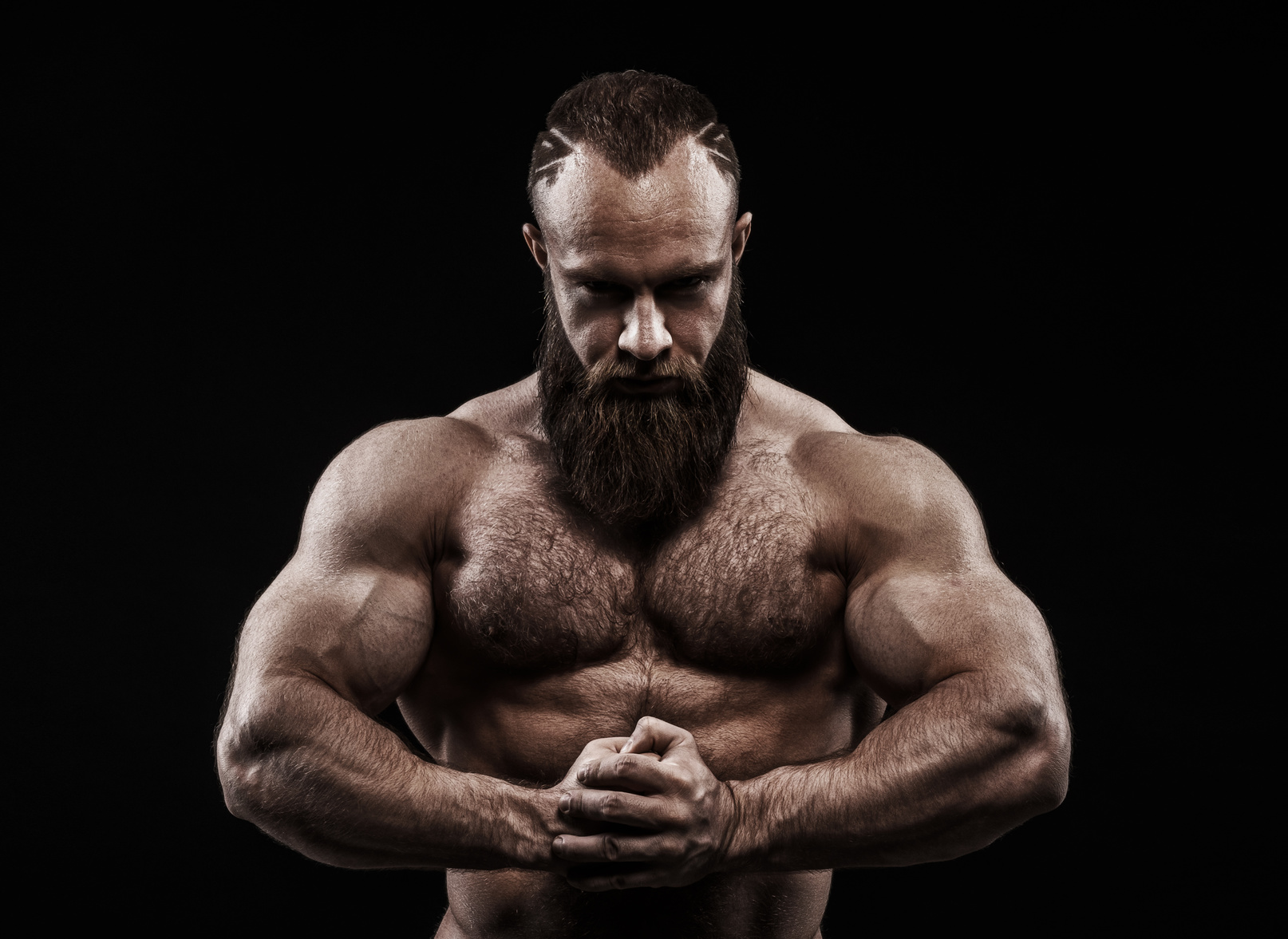 Why Women Love Brutish Looking Men by Charles Sledge
